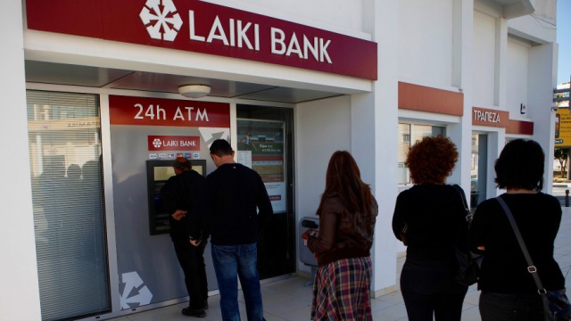 Panicked depositors form queues at Cypriot ATMs